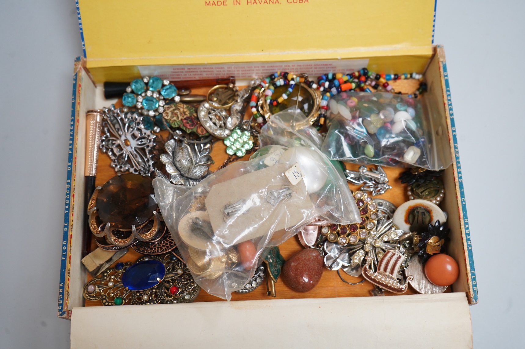 A group of assorted costume jewellery, glass beads etc.